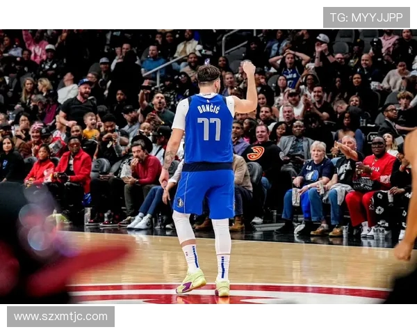 东契奇狂砍73分刷新现役得分纪录独行侠击败太阳终结其11连胜